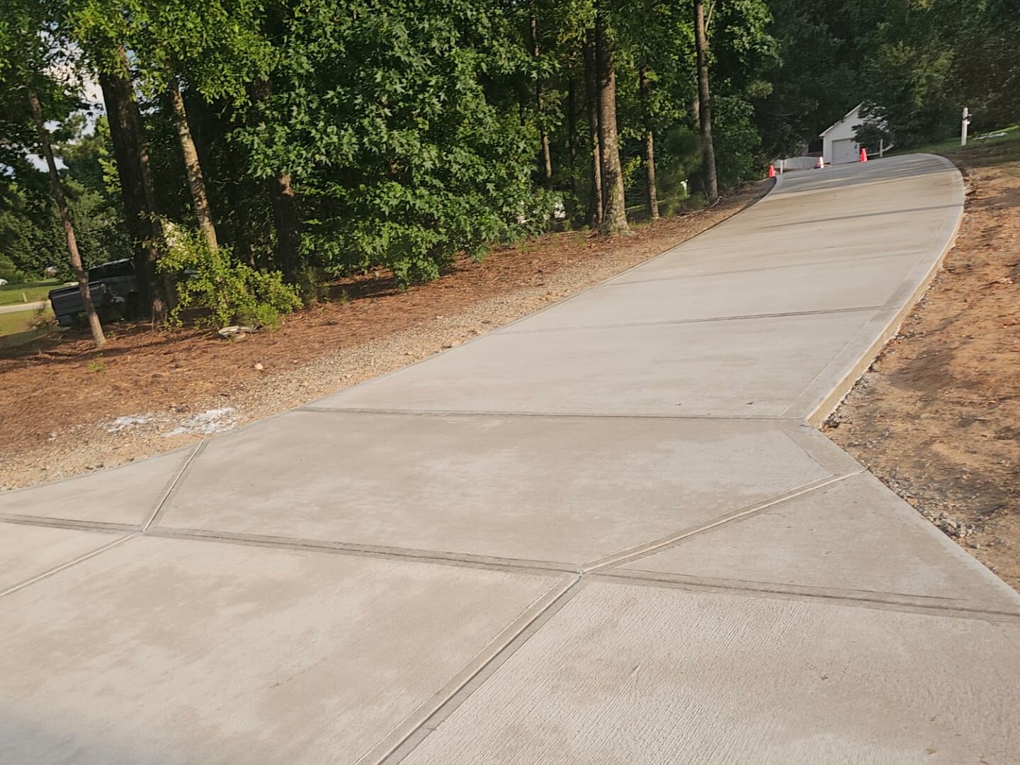 New concrete driveway poured by Alpha Concrete